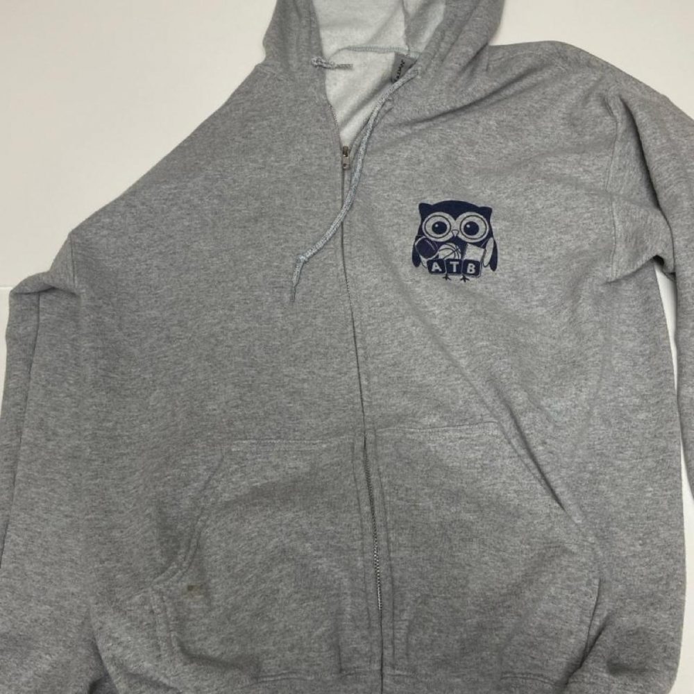 Gray Gildan zip-up hoodie with blue owl graphic holding a football and basketbal